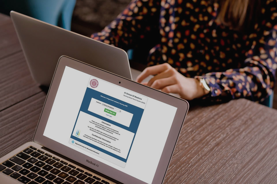 A laptop showing the teaching EHR patient record interface